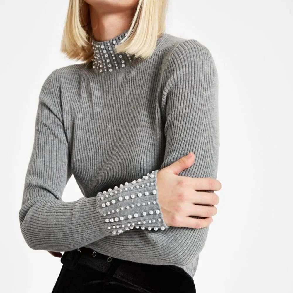 Embellished turtleneck sweater-